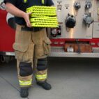 Holding HiVis GoTreads XL in front of a fire truck